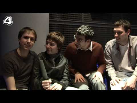 Trailer frame of the lads posing like rock stars — undercut seconds later by reality