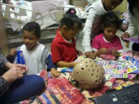 Prayers for Gina Garcia, Kera, Mya and Jose decorating Mommy's Helmet