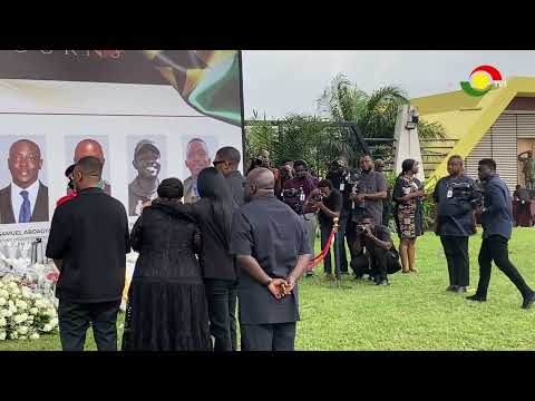 Tears flow as First Lady Lordina Mahama lays flowers for crash victims, joined by top officials
