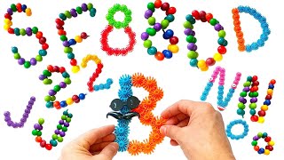 Download the video "How easy it is to make all the letters from multi-colored balls New Building blocks for thinking"