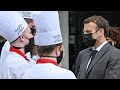 French President Macron slapped during crowd stop