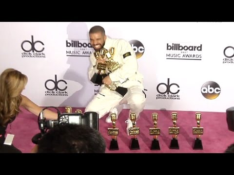 Drake Flaunts His Record-Breaking 13 Awards Backstage At The Billboard Music Awards