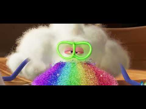 Trolls Band Together trailer end card in rainbow confetti, echoing the feel-good finale