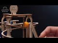 Miniature vidéo Maqueta de madera: circuito de bolas en espiral