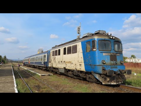 Romania: CFR Class 60 Sulzer diesel leaves Babeni station on a Podu Olt - Piatra Olt passenger train