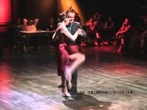  Esteban Moreno  and  Claudia Codega  are  dancing  to  the  tango  "  Amurado  "