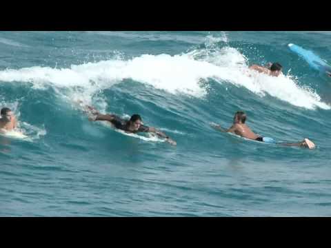 Fun waves and surfing at Lake Worth Pier