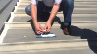 High solids silicone pull adhesion test.  (Roof coating)