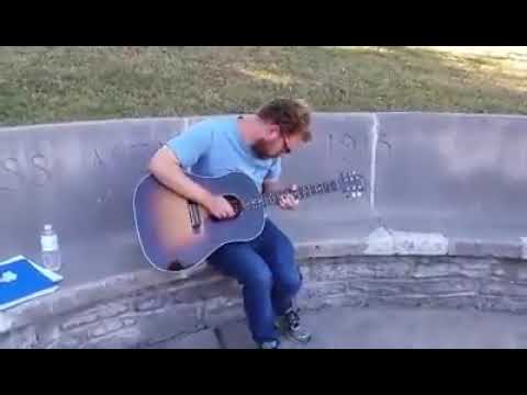 Chris playing guitar
