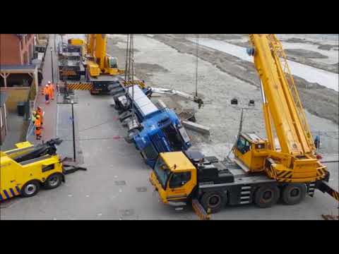 Berging omgevallen vrachtwagen tijdens lossen heipalen