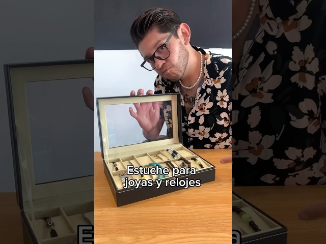 Vídeo relacionado con Uten Caja para Relojes Con 6 Compartimentos, Hebilla de Metal, Almohadilla Extraíble, Tapa de Vidrio, para Guardar Joyas, Cuero PU Negro, Forro Negro