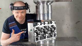 Crushing Tractor Engine Head with 300 Ton Hydraulic Press