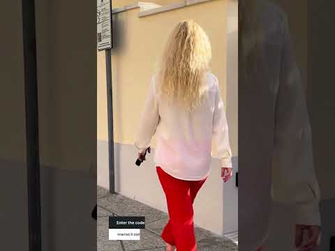 Short mobile video showing how to open the VIP Parking gate at Via Sassari 20 for Rental12 guests