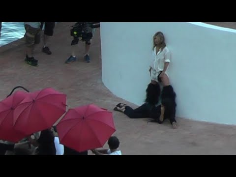 Kate Moss snapped by paparazzi in Capri: the sexy YSL commercial is being filmed.