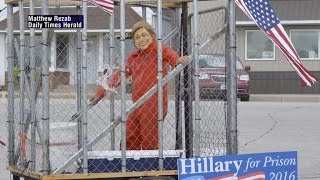 Controversy Looms Over Float With Hillary Clinton In Prison Jumpsuit Inside Cage