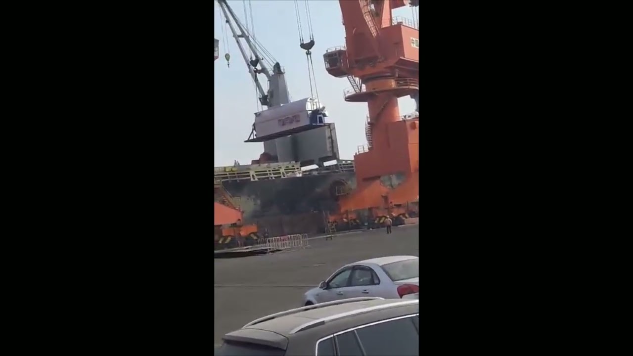 Dryer Loading on ship by crane, TG Machines