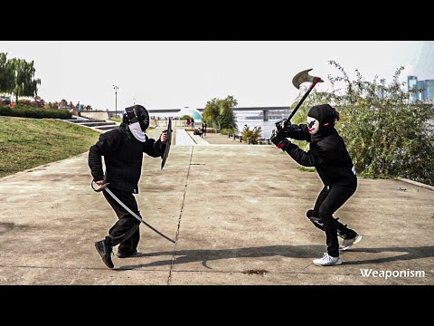 Can 'BATTLE AXE'  be stopped with a sword + shield?