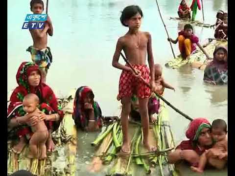 কুড়িগ্রামে প্লাবিত এলাকায় দুর্গত মানুষের একমাত্র ভরসা এখন ভেলা