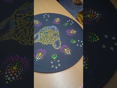 GARRITAS cachorro jaguar en puntillismo