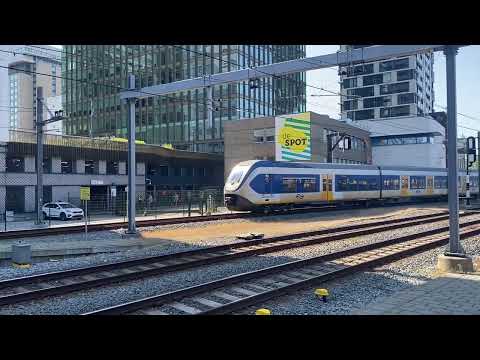 Different regional and international trains arriving at Utrecht station in the Netherlands.