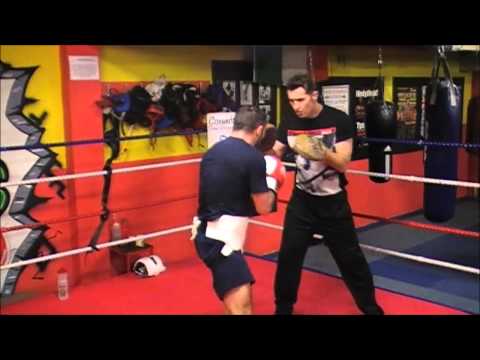 Stephen Ormond working the pads in preparation for Terry Flanagan