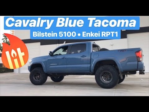 Cavalry Blue Toyota Tacoma Lifted on Enkei RPT1 Wheels & 33" Tires