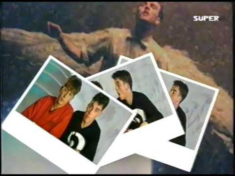 Robbie Wiliams and Mark Owen present the "Music News in 5" on Super Channel (1992).