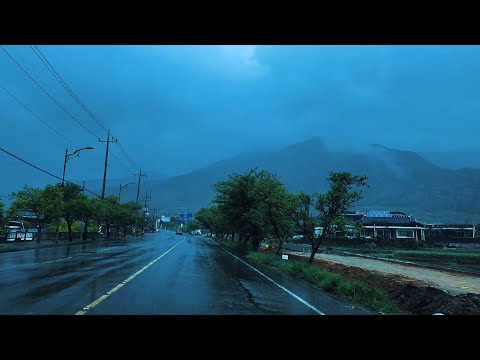 [4K. Rain Drive] Driving in the rain on a forested country road. Rural Forest Road