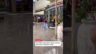 Girl falls hard after giant swing hits her in Mexico mall