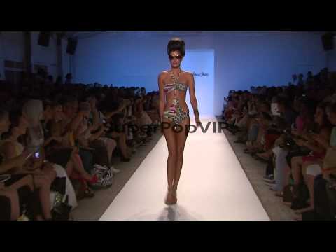 Models walk the runway during the Poko Pano swimwear 2013...