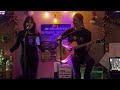 Violet Nova acoustic duo Please Come Home for Christmas