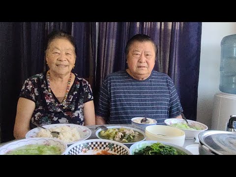 Bitter melon gourd chicken soup with side dishes and tomato pepper brunch