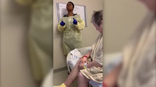 Nurse sings "Amazing Grace" to patient