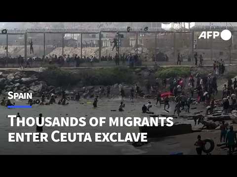 Video Thumbnail: Hundreds of migrants flood into Spain's Ceuta exclave from Morocco | AFP