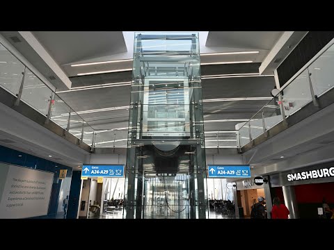 Charlotte, NC: Epic MEI Hydraulic Glass Elevator at the A Gates Charlotte Airport