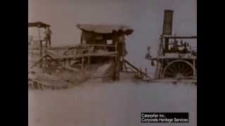 Video of machine, shown pulling a combine, built to replace teams of horses.