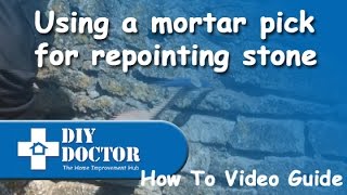 Raking or chopping out joints in stone walls for repointing