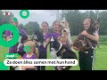 Deze kinderen zijn op kamp met hun hond