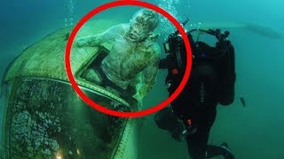 Diver Solves 75 Year Old Mystery After Body Trapped In Plane Grabs Hold Of Him... video