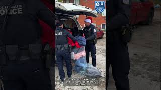 Columbus Police officers deliver coats to kids