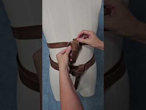 Part of a video titled How To Tie a Ring Belt - YouTube
