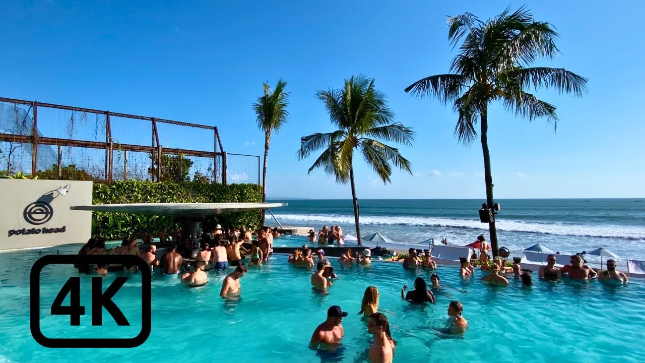 Experience a walking tour of Potato Head Beach Club.