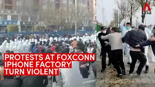 Foxconn protests turn violent, workers clash with security at massive iPhone factory in China