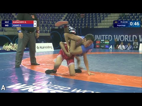 Repechage FS - 42 kg: A. KARACHOV (KGZ) df. S. IGAVE (IND) by TF, 10-0