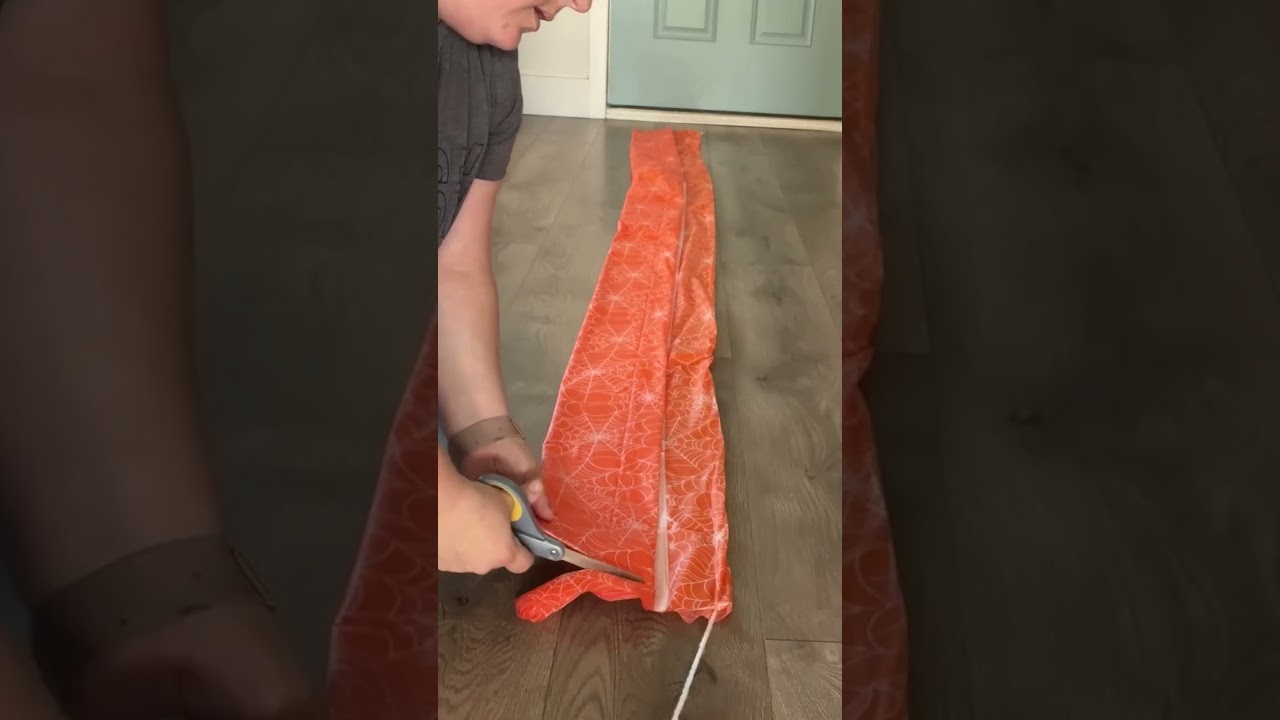 Buy a Dollar Store tablecloth for this GENIUS dining room idea!