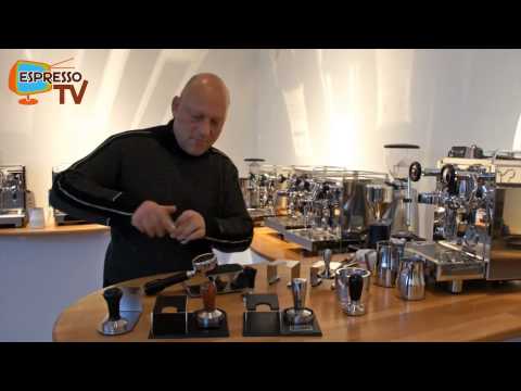 Tampers and tamping stations