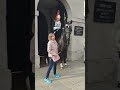 The horse keeps nudging the tourist's #horseguardsparade