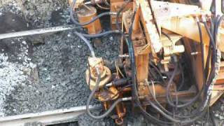 preview picture of video 'CSX Ballast Tamper Tampng Ballast Closeup'