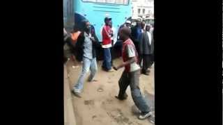 preview picture of video 'Drunk Men Fighting on River road Nairobi'