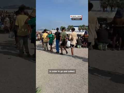Hundreds of migrants build makeshift shelter on Ceuta beach